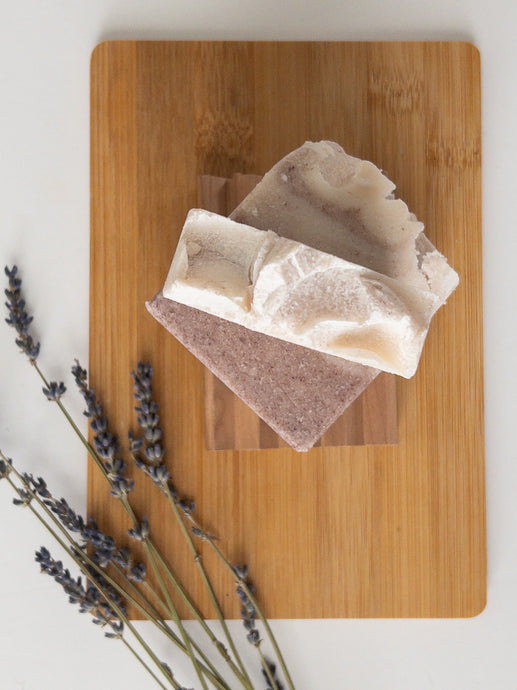 Trades of Brit Amethyst Salt Soap Bar on a wooden surface