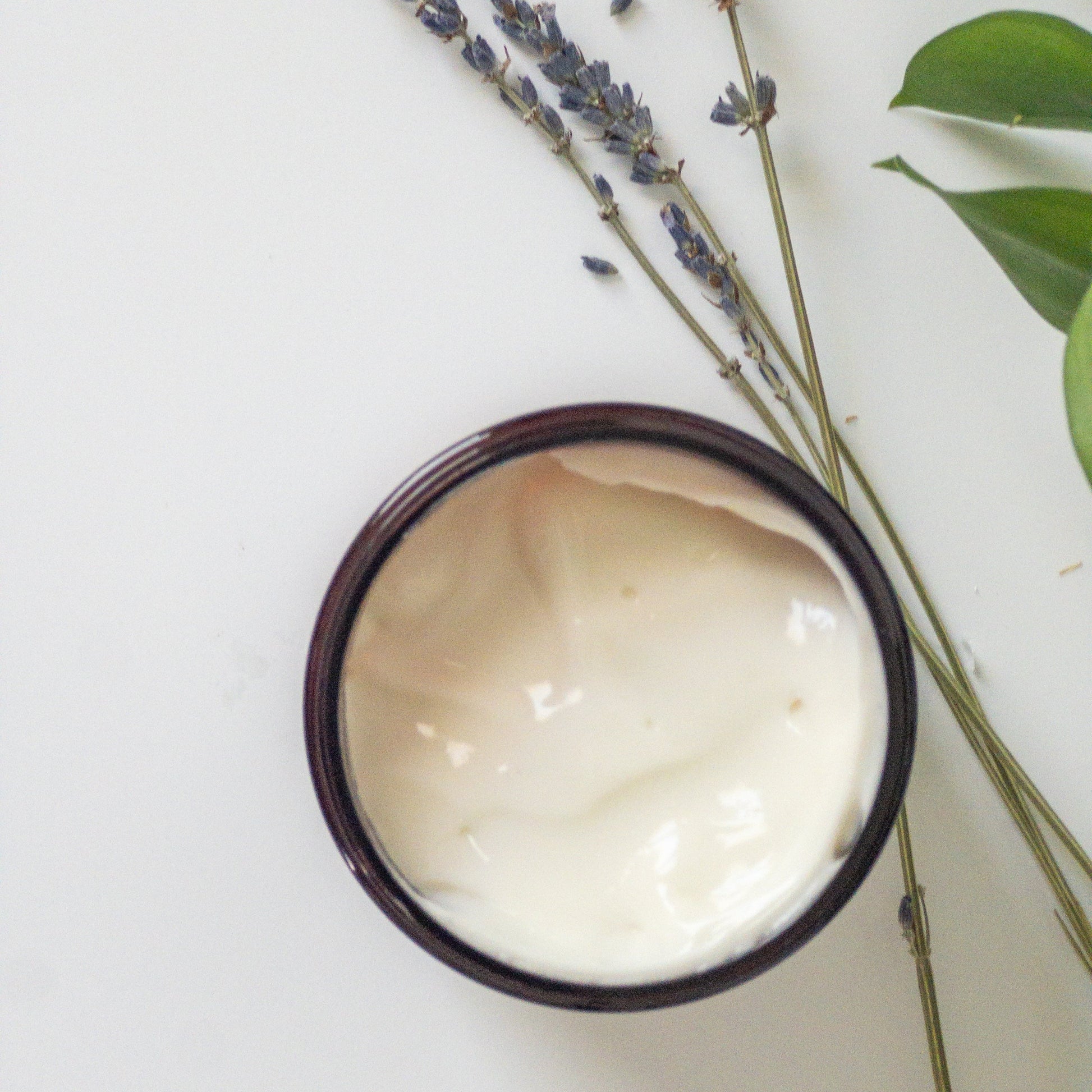 Close-up of the creamy, luxurious texture of Trades of Brit Lavender Calendula Body Cream